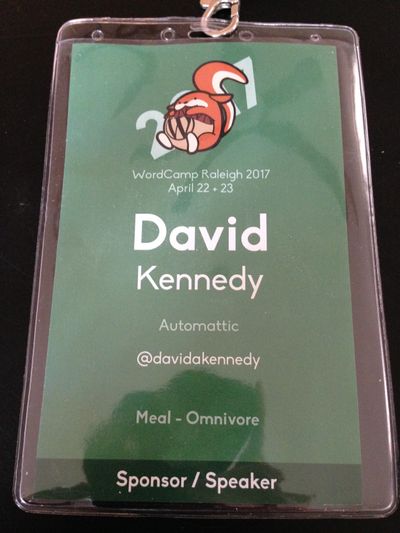 WordCamp Raleigh 2017 conference badge with green background and white type with the words David A. Kennedy.