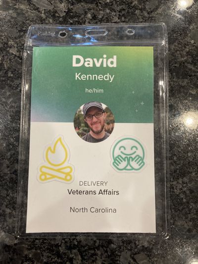 Ad Hoc Retreat 2022 conference badge, with green and white colors and the words David Kennedy, Ad Hoc Retreat 2022.