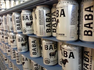 Baba, a black lager in many rows of cans, is one of the beers that Uinta Brewing makes.