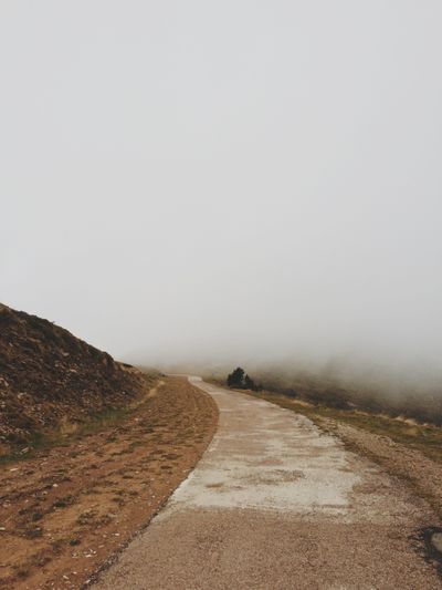 Curvy road with fog.