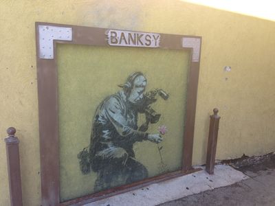 Banksy original graffiti on side of building in Park City, Utah.
