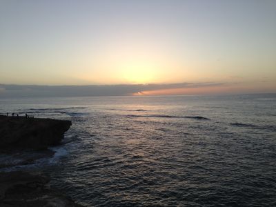 The Hawaiian shoreline near Lihue with the sun peeking through.