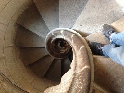 A long set of stairs in La Sagrada Familia, an ornate church in Barcelona, Spain.