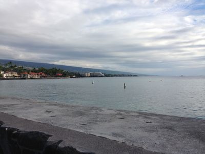 A shoreline with clouds in the background.