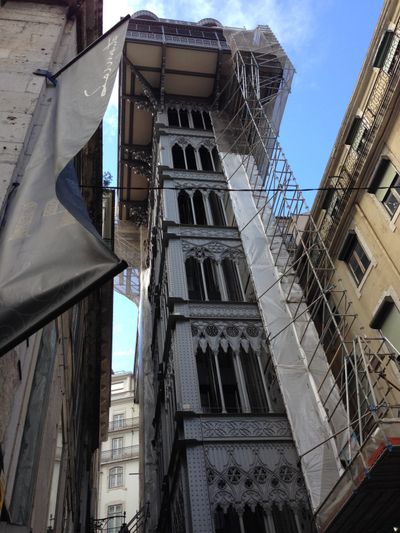 Santa Justa Lift in Lisbon, looking up into the sky.