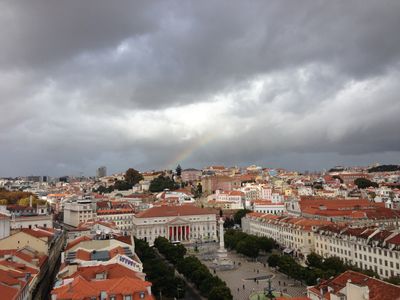 A rainbow, seen from the Santa Justa Lift in Lisbon.
